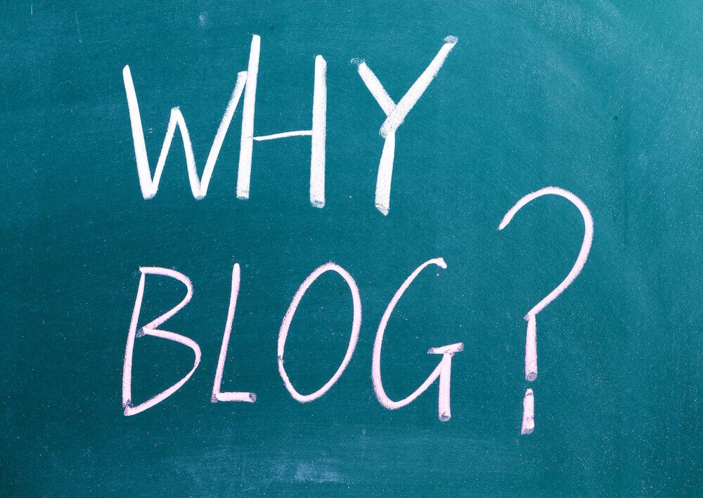 "Why Blog" written on chalk board